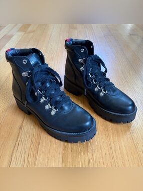 Steve Madden Black Lace-Up Lug Sole Ankle Boots with Red Heel Tab